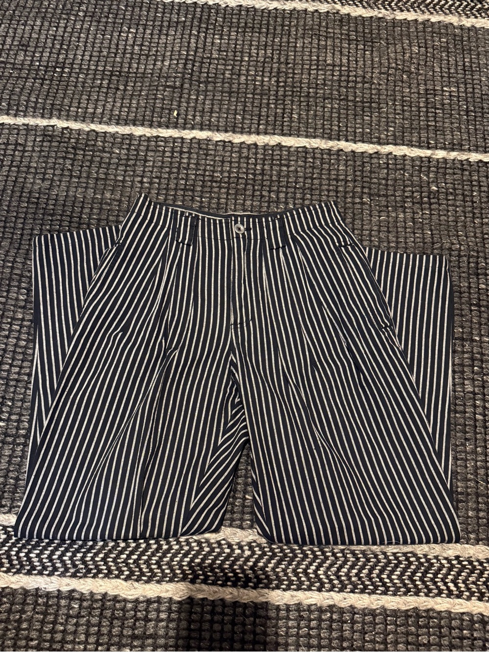 Black and white stripped straight legged trousers